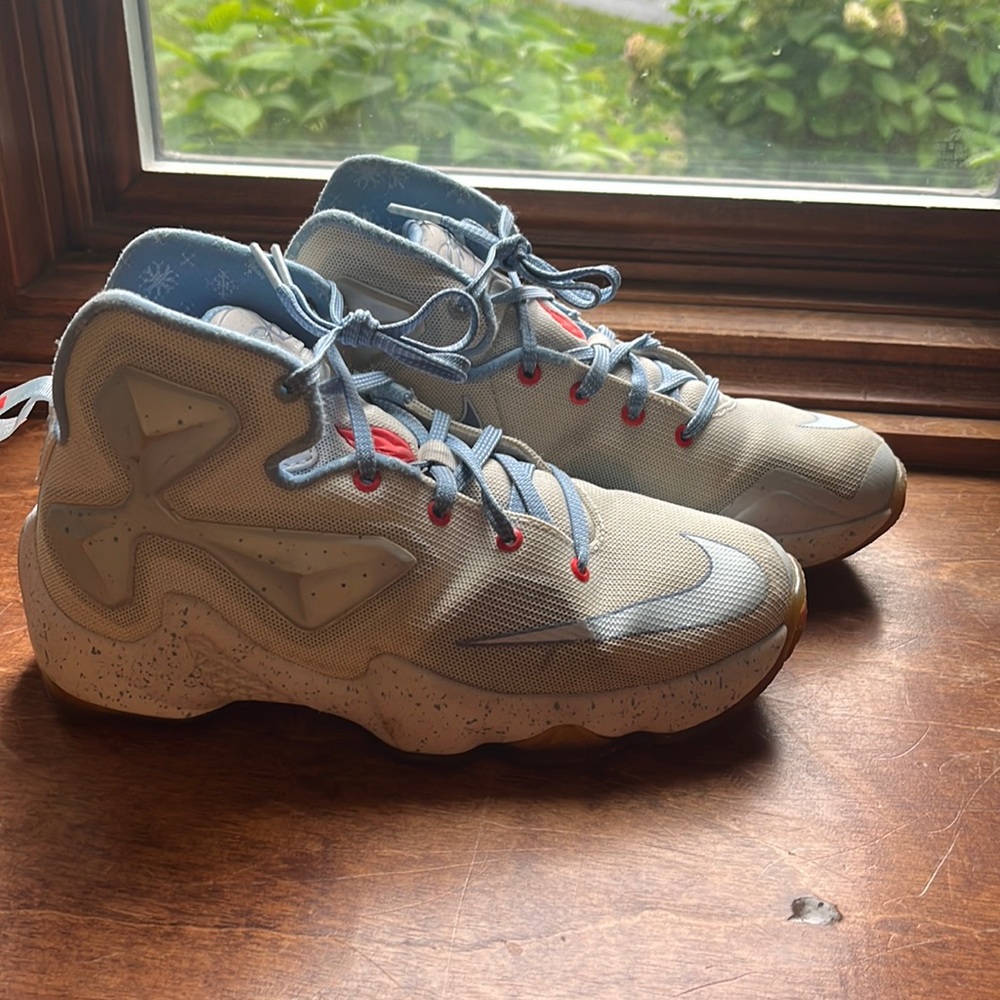Nike Size 4 Youth Lebron Fire and Ice slightly worn. Light blue and white.